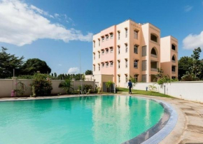 Karibu Nyumbani (2 bdroom apt with a swimming pool